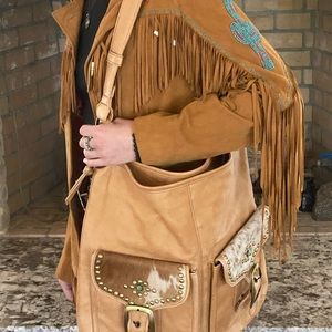 Tasha Polizzi over the shoulder Stable Tote in soft sheep wash leather